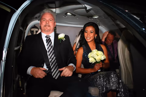 Couple during Las Vegas Strip helicopter wedding night flight